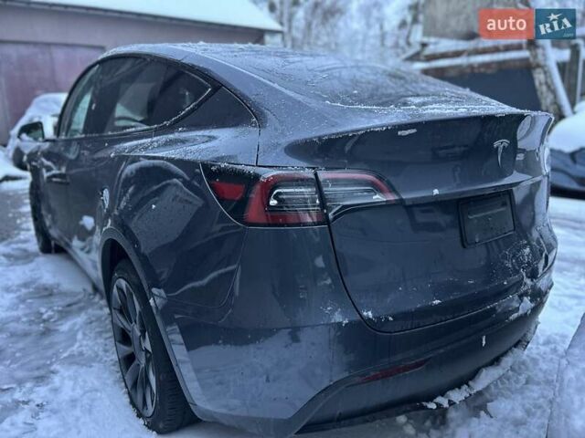 Серый Тесла Model Y, объемом двигателя 0 л и пробегом 26 тыс. км за 18900 $, фото 4 на Automoto.ua