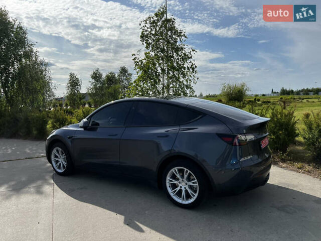 Серый Тесла Model Y, объемом двигателя 0 л и пробегом 19 тыс. км за 25800 $, фото 2 на Automoto.ua