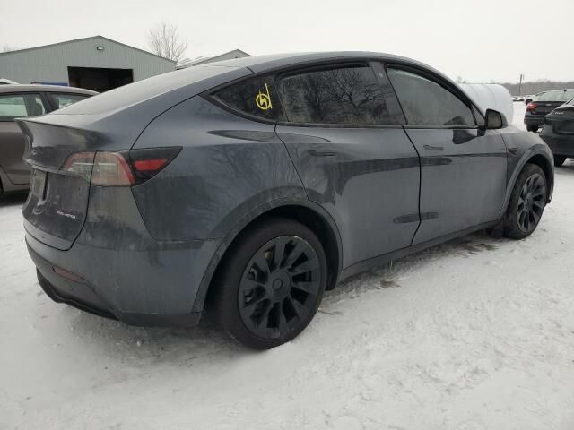 Серый Тесла Model Y, объемом двигателя 0 л и пробегом 0 тыс. км за 23500 $, фото 5 на Automoto.ua
