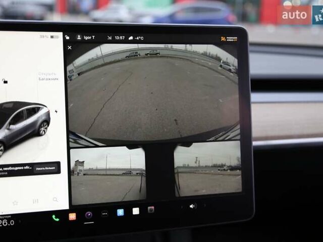 Серый Тесла Model Y, объемом двигателя 0 л и пробегом 50 тыс. км за 33900 $, фото 2 на Automoto.ua