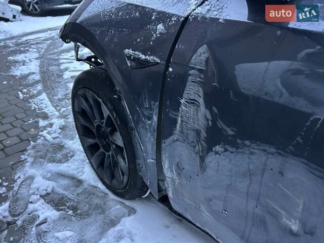 Серый Тесла Model Y, объемом двигателя 0 л и пробегом 26 тыс. км за 18900 $, фото 5 на Automoto.ua