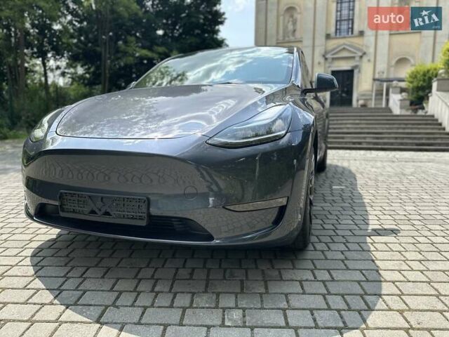Серый Тесла Model Y, объемом двигателя 0 л и пробегом 55 тыс. км за 25100 $, фото 18 на Automoto.ua