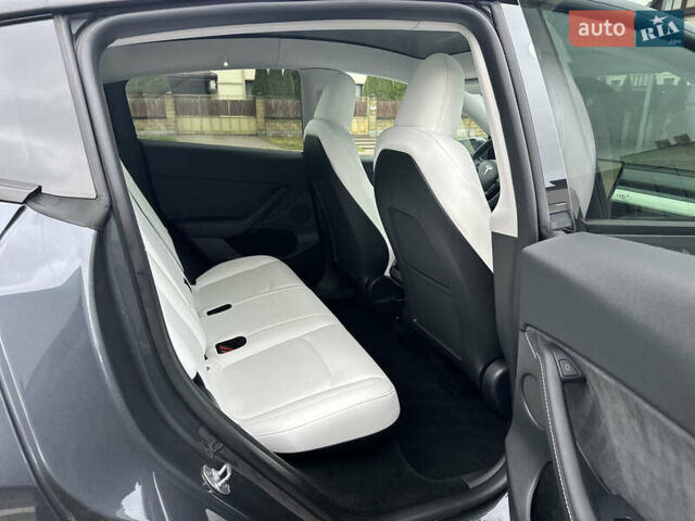 Сірий Тесла Model Y, об'ємом двигуна 0 л та пробігом 26 тис. км за 25999 $, фото 61 на Automoto.ua