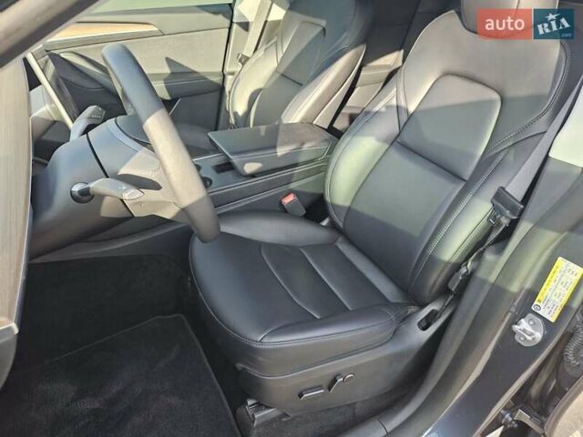 Серый Тесла Model Y, объемом двигателя 0 л и пробегом 34 тыс. км за 28300 $, фото 16 на Automoto.ua