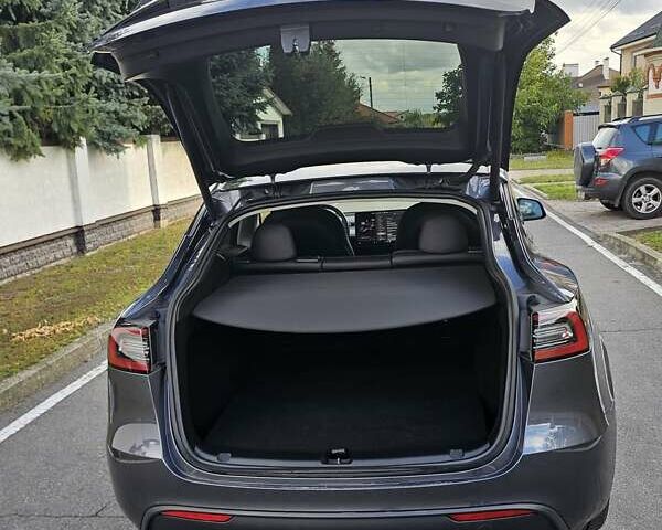 Серый Тесла Model Y, объемом двигателя 0 л и пробегом 38 тыс. км за 27900 $, фото 14 на Automoto.ua