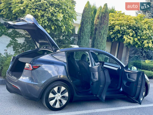 Серый Тесла Model Y, объемом двигателя 0 л и пробегом 21 тыс. км за 25300 $, фото 14 на Automoto.ua