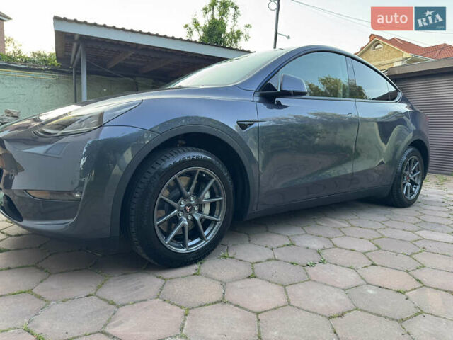 Серый Тесла Model Y, объемом двигателя 0 л и пробегом 24 тыс. км за 26400 $, фото 1 на Automoto.ua