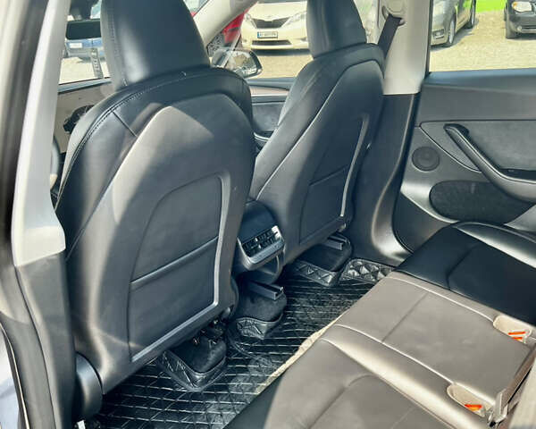 Серый Тесла Model Y, объемом двигателя 0 л и пробегом 11 тыс. км за 36999 $, фото 10 на Automoto.ua