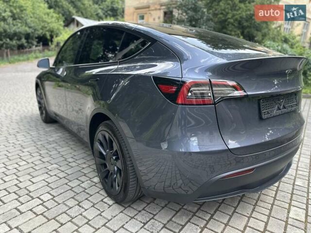 Серый Тесла Model Y, объемом двигателя 0 л и пробегом 55 тыс. км за 25100 $, фото 32 на Automoto.ua
