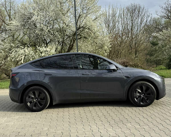 Серый Тесла Model Y, объемом двигателя 0 л и пробегом 25 тыс. км за 27100 $, фото 5 на Automoto.ua