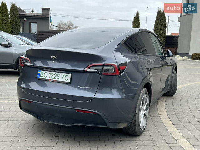 Серый Тесла Model Y, объемом двигателя 0 л и пробегом 52 тыс. км за 27499 $, фото 11 на Automoto.ua