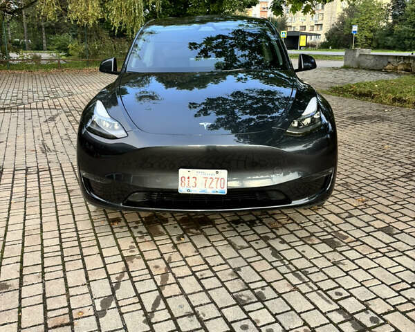 Серый Тесла Model Y, объемом двигателя 0 л и пробегом 30 тыс. км за 23500 $, фото 1 на Automoto.ua
