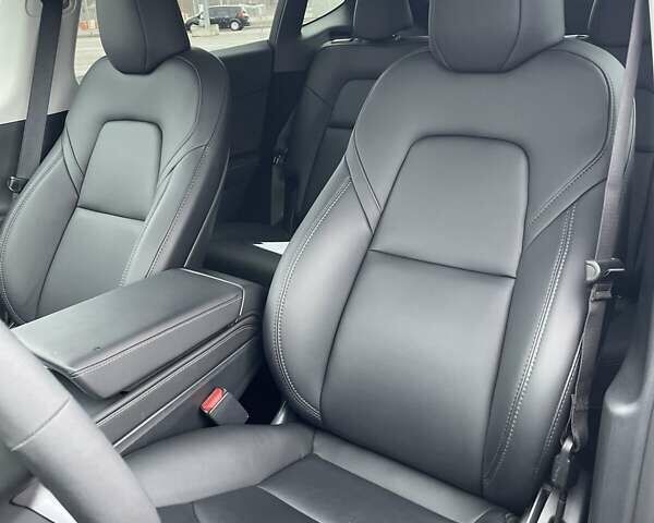 Серый Тесла Model Y, объемом двигателя 0 л и пробегом 16 тыс. км за 27950 $, фото 17 на Automoto.ua