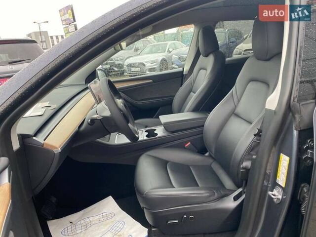 Серый Тесла Model Y, объемом двигателя 0 л и пробегом 30 тыс. км за 31700 $, фото 15 на Automoto.ua