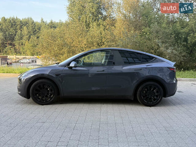 Серый Тесла Model Y, объемом двигателя 0 л и пробегом 49 тыс. км за 27000 $, фото 3 на Automoto.ua