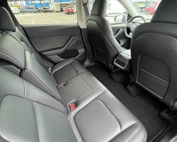Серый Тесла Model Y, объемом двигателя 0 л и пробегом 51 тыс. км за 28900 $, фото 18 на Automoto.ua