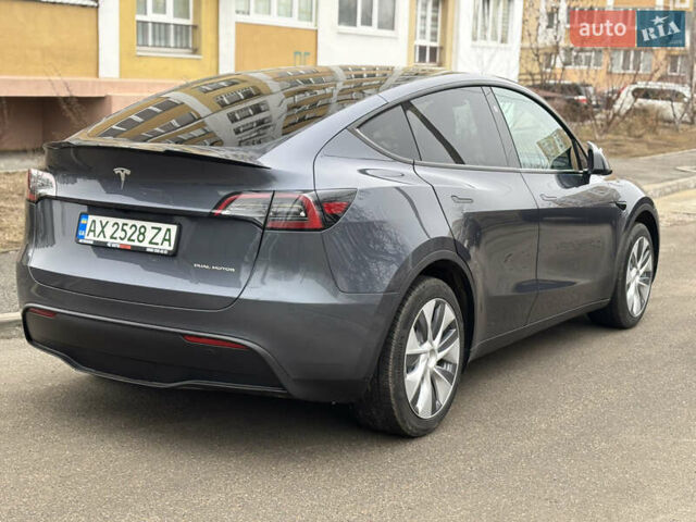 Серый Тесла Model Y, объемом двигателя 0 л и пробегом 20 тыс. км за 27000 $, фото 3 на Automoto.ua
