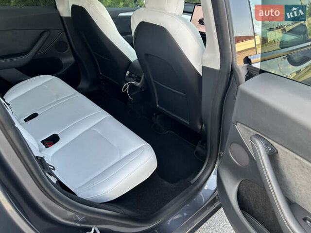 Серый Тесла Model Y, объемом двигателя 0 л и пробегом 55 тыс. км за 29500 $, фото 16 на Automoto.ua