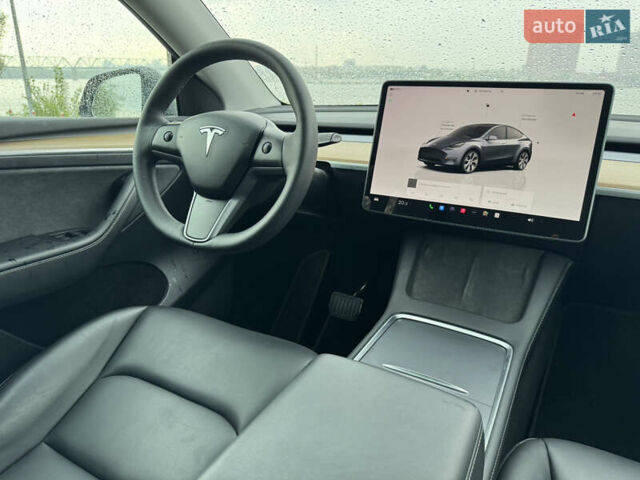 Серый Тесла Model Y, объемом двигателя 0 л и пробегом 66 тыс. км за 27900 $, фото 17 на Automoto.ua