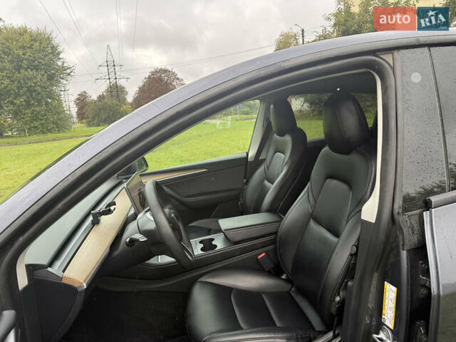 Серый Тесла Model Y, объемом двигателя 0 л и пробегом 44 тыс. км за 26900 $, фото 3 на Automoto.ua