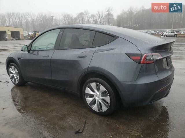 Серый Тесла Model Y, объемом двигателя 0 л и пробегом 35 тыс. км за 17000 $, фото 1 на Automoto.ua