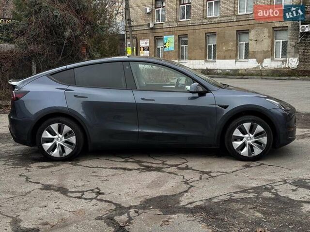 Сірий Тесла Model Y, об'ємом двигуна 0 л та пробігом 22 тис. км за 25990 $, фото 7 на Automoto.ua