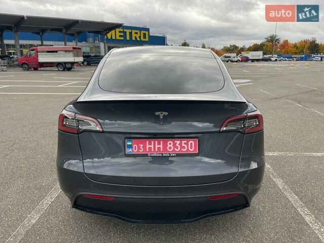 Серый Тесла Model Y, объемом двигателя 0 л и пробегом 51 тыс. км за 28900 $, фото 9 на Automoto.ua