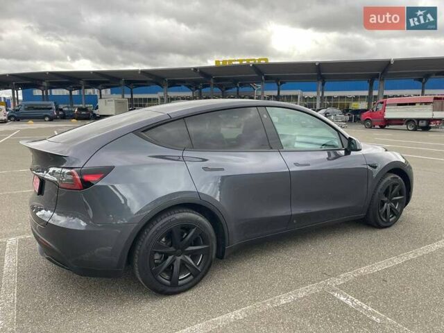Серый Тесла Model Y, объемом двигателя 0 л и пробегом 51 тыс. км за 28900 $, фото 7 на Automoto.ua