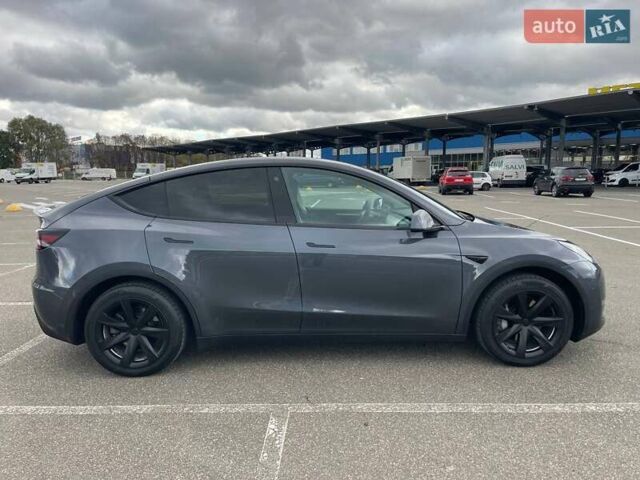 Серый Тесла Model Y, объемом двигателя 0 л и пробегом 51 тыс. км за 28900 $, фото 6 на Automoto.ua