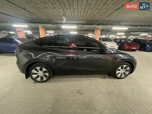 Серый Тесла Model Y, объемом двигателя 0 л и пробегом 15 тыс. км за 31999 $, фото 6 на Automoto.ua