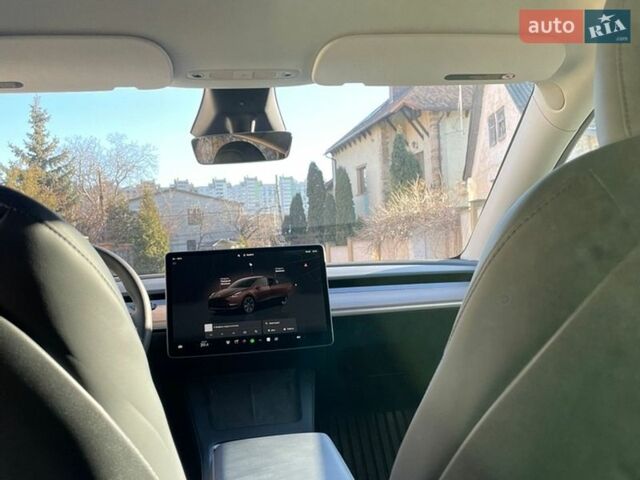 Серый Тесла Model Y, объемом двигателя 0 л и пробегом 14 тыс. км за 26990 $, фото 11 на Automoto.ua