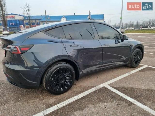 Серый Тесла Model Y, объемом двигателя 0 л и пробегом 24 тыс. км за 30900 $, фото 7 на Automoto.ua