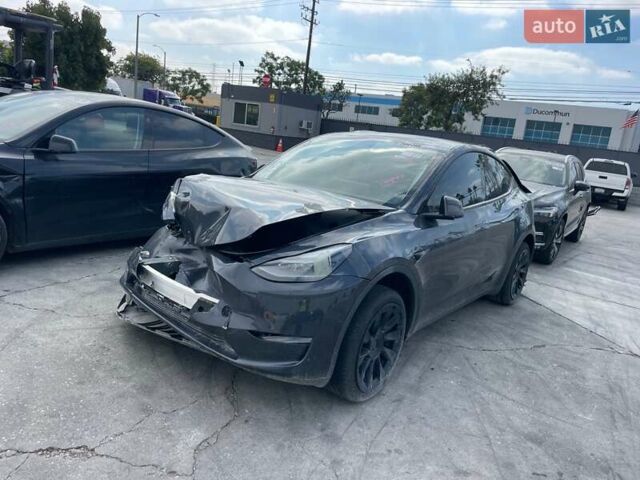 Серый Тесла Model Y, объемом двигателя 0 л и пробегом 36 тыс. км за 17800 $, фото 2 на Automoto.ua