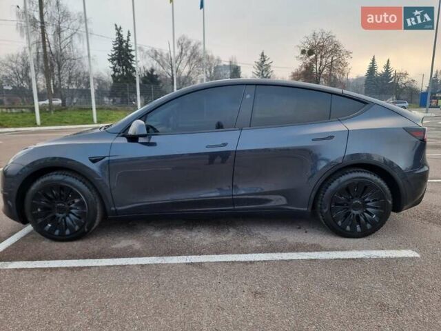 Серый Тесла Model Y, объемом двигателя 0 л и пробегом 24 тыс. км за 30900 $, фото 3 на Automoto.ua