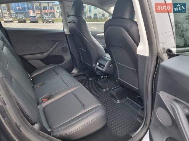Серый Тесла Model Y, объемом двигателя 0 л и пробегом 24 тыс. км за 30900 $, фото 17 на Automoto.ua