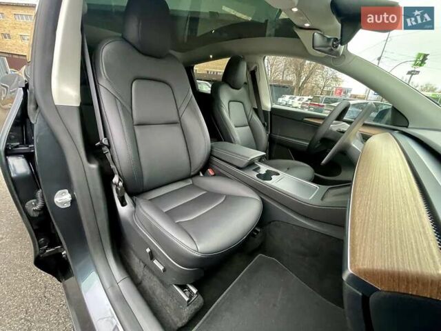Серый Тесла Model Y, объемом двигателя 0 л и пробегом 23 тыс. км за 28800 $, фото 22 на Automoto.ua