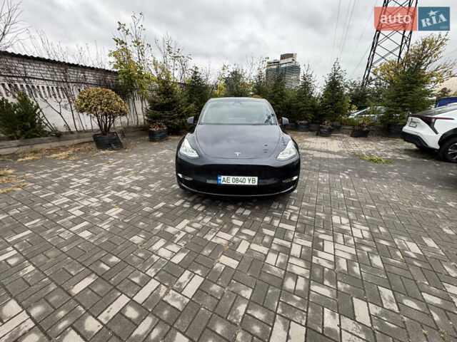 Серый Тесла Model Y, объемом двигателя 0 л и пробегом 8 тыс. км за 31999 $, фото 2 на Automoto.ua