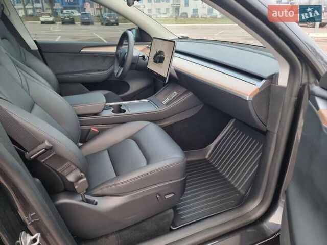 Серый Тесла Model Y, объемом двигателя 0 л и пробегом 24 тыс. км за 30900 $, фото 23 на Automoto.ua