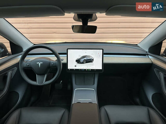Серый Тесла Model Y, объемом двигателя 0 л и пробегом 2 тыс. км за 35490 $, фото 45 на Automoto.ua