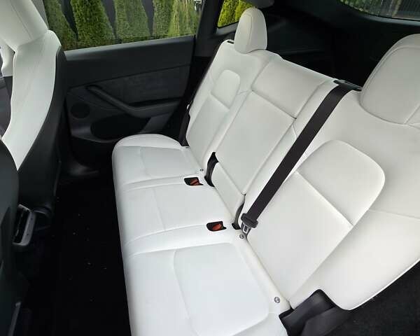 Серый Тесла Model Y, объемом двигателя 0 л и пробегом 128 тыс. км за 35700 $, фото 2 на Automoto.ua