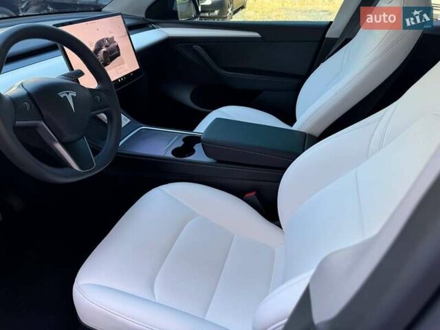 Серый Тесла Model Y, объемом двигателя 0 л и пробегом 22 тыс. км за 30900 $, фото 20 на Automoto.ua