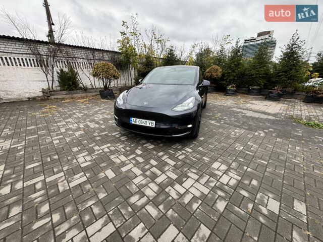 Серый Тесла Model Y, объемом двигателя 0 л и пробегом 8 тыс. км за 31999 $, фото 1 на Automoto.ua