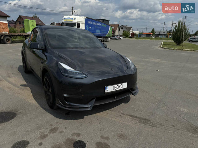 Серый Тесла Model Y, объемом двигателя 0 л и пробегом 19 тыс. км за 38000 $, фото 1 на Automoto.ua
