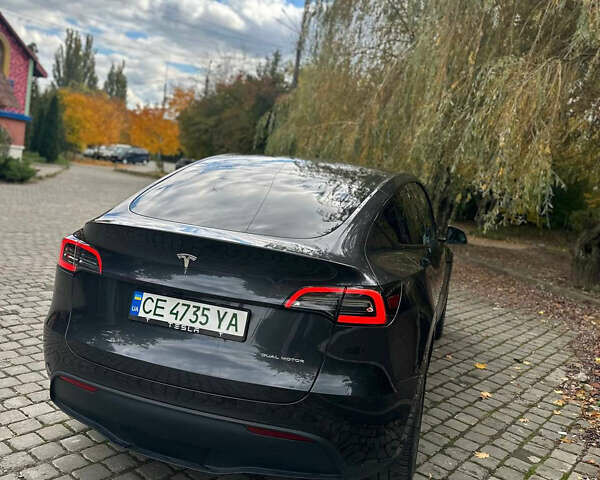 Серый Тесла Model Y, объемом двигателя 0 л и пробегом 26 тыс. км за 31700 $, фото 1 на Automoto.ua