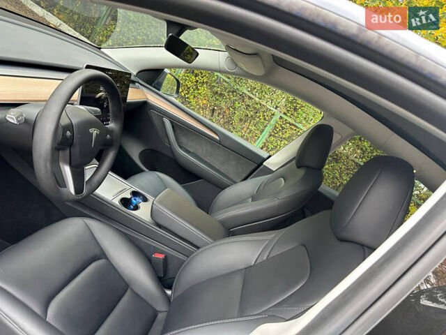 Серый Тесла Model Y, объемом двигателя 0 л и пробегом 26 тыс. км за 31700 $, фото 15 на Automoto.ua