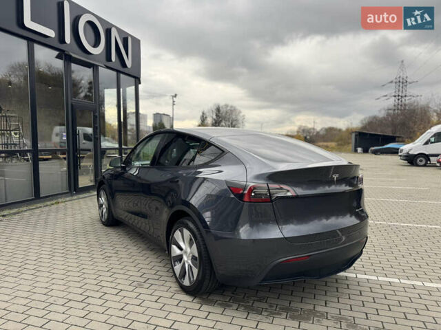 Сірий Тесла Model Y, об'ємом двигуна 0 л та пробігом 25 тис. км за 26999 $, фото 7 на Automoto.ua