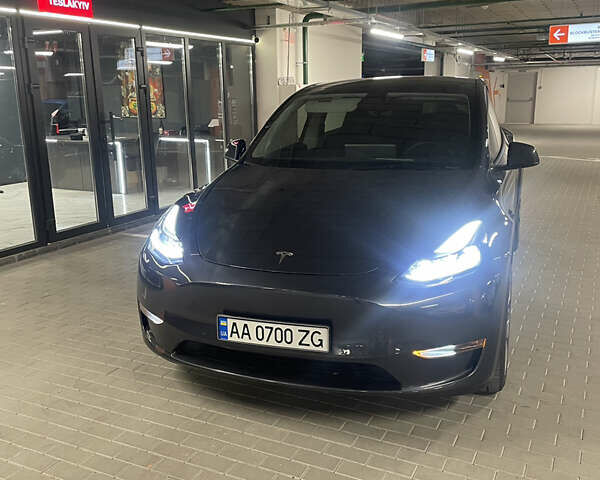 Серый Тесла Model Y, объемом двигателя 0 л и пробегом 15 тыс. км за 31999 $, фото 1 на Automoto.ua