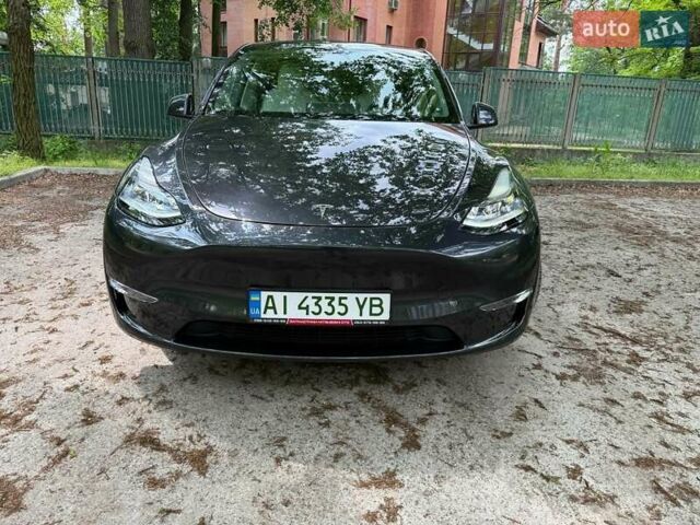 Серый Тесла Model Y, объемом двигателя 0 л и пробегом 9 тыс. км за 29990 $, фото 1 на Automoto.ua