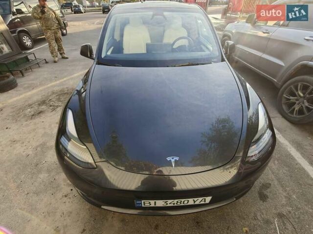 Серый Тесла Model Y, объемом двигателя 0 л и пробегом 21 тыс. км за 34000 $, фото 1 на Automoto.ua