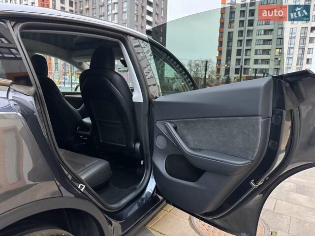 Сірий Тесла Model Y, об'ємом двигуна 0 л та пробігом 27 тис. км за 30900 $, фото 19 на Automoto.ua
